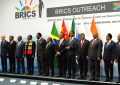 Mehrere Personen auf dem Brics-Gipfel in Südafrika 2010